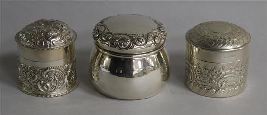 Two late Victorian repousse silver boxes and covers including William Comyns and one other sterling silver box and cover, 7.5 oz.